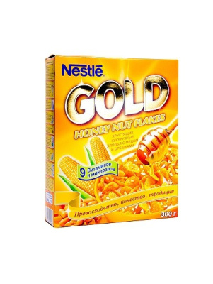 Хлопья Nestle Голд Флейкс кукурузные с медом и орехами 300г